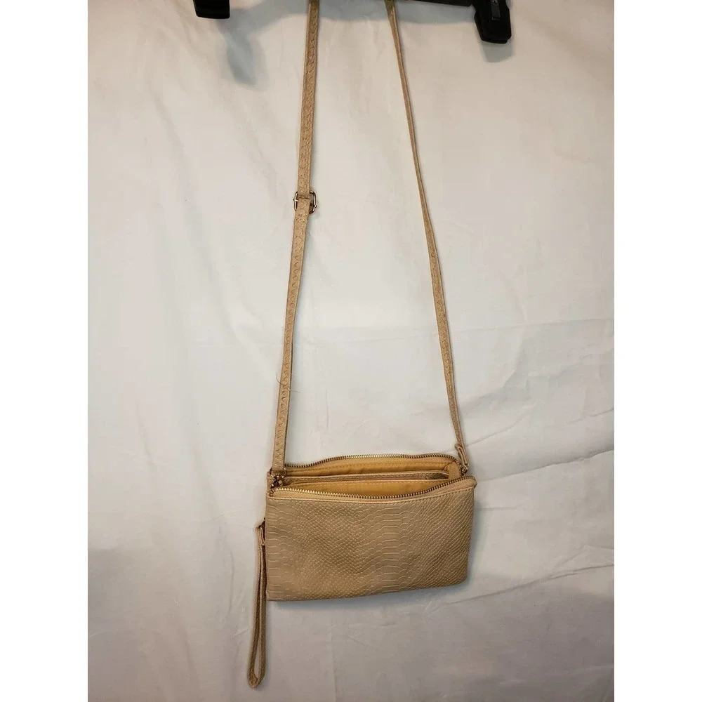 Tan crossbody. Approx 20